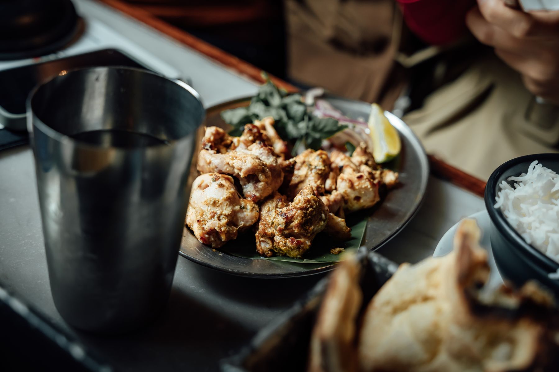 Plate of chicken tikka with rice